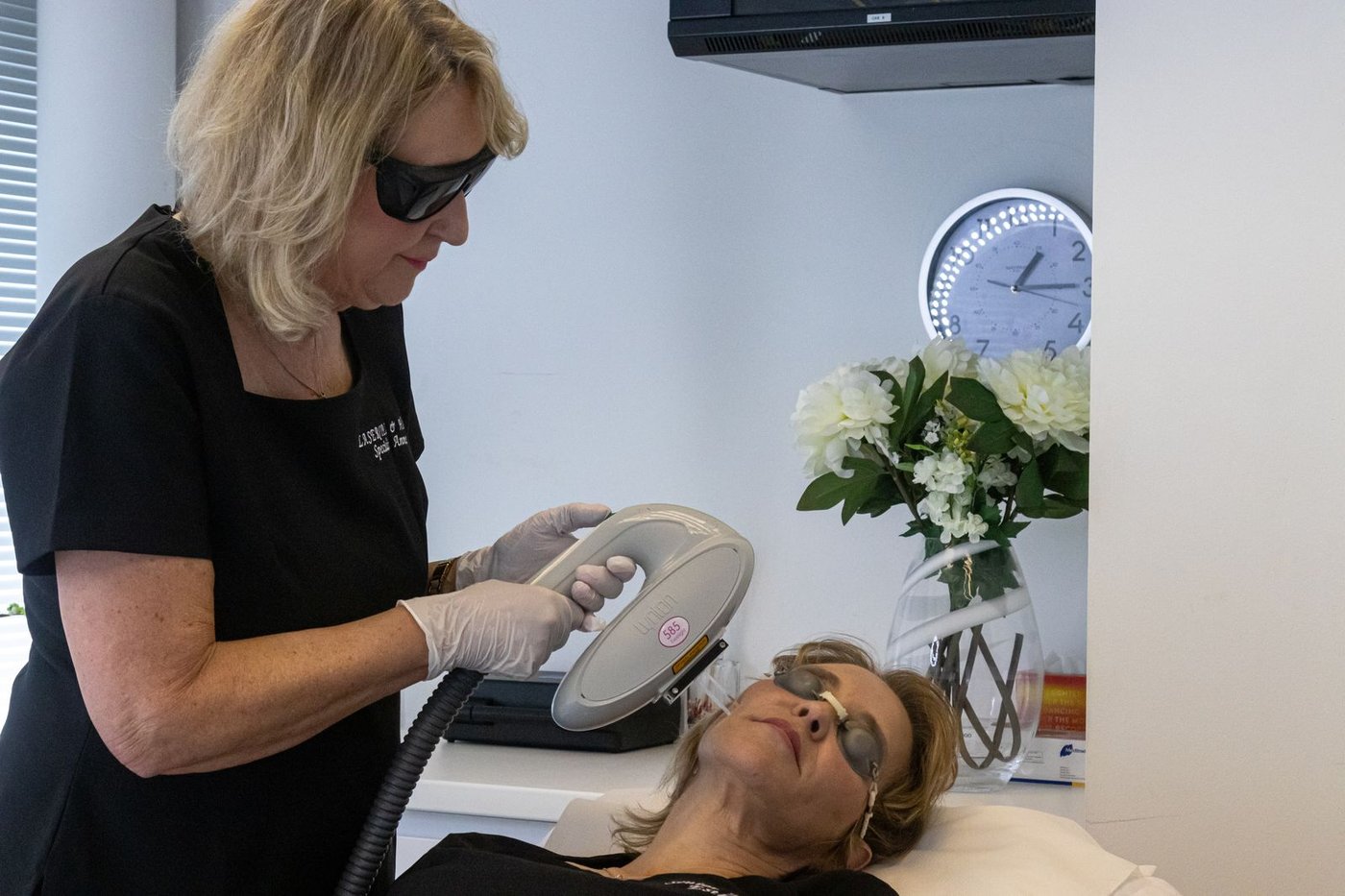 Anne performing an IPL treatment with the Lynton system at Lumos Skin, Basingstoke